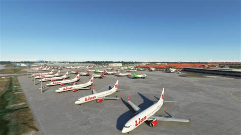 grounded aircraft at Jakarta Soekarno-Hatta Airport due to ongoing severe weather and air traffic backup