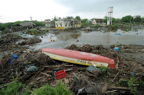 grounded boats and wreckage after 2004 tsunami near shore