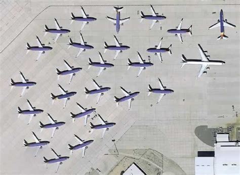 grounded Boeing 737 MAX aircraft lined up at storage facility in Victorville, California