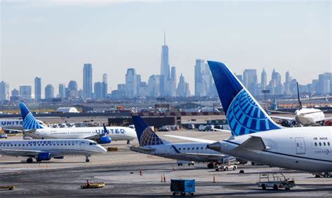 grounded commercial aircraft at Newark Liberty International Airport during weather delay