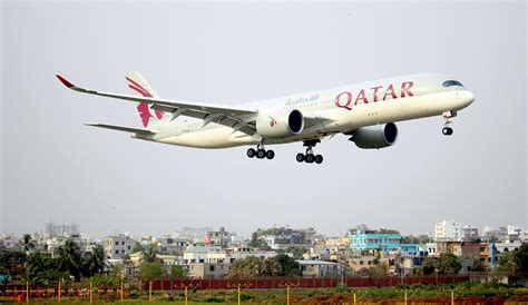 grounded Qatar Airways aircraft at JFK due to summer storm delays June 2025