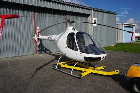 Guimbal Cabri G2 undergoing maintenance with engine exposed at Aix-en-Provence facility, 2019