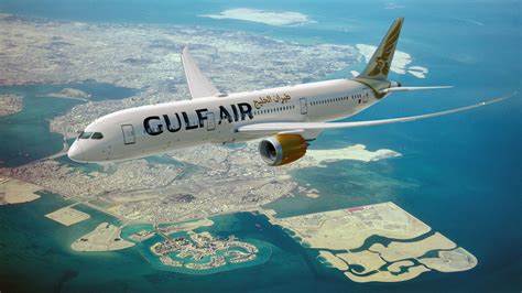 Gulf Air Dreamliner parked at Bahrain International Airport at sunset