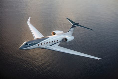 Gulfstream G650, G700, and G800 jets in a line-up on tarmac