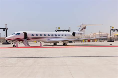 Gulfstream G700 parked on executive airport ramp with private aviation setting