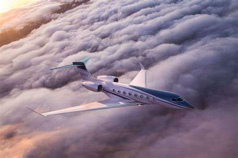 Gulfstream G800 business jet flying above clouds