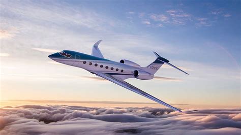Gulfstream G800 in flight over ocean, showcasing range and design aesthetics