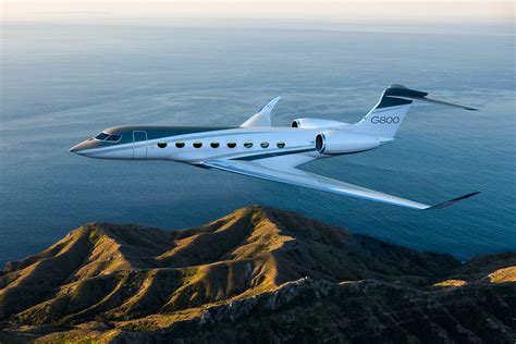 Gulfstream G800 ultra long range private jet over ocean