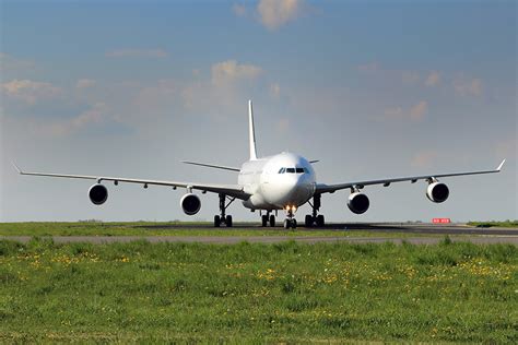 Halifax Stanfield runway with widebody aircraft during sunset