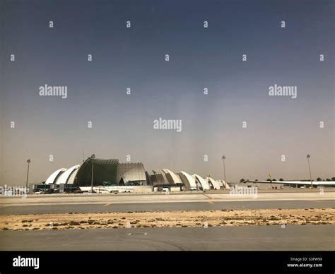 Hamad International Airport runway Doha Qatar desert heat operations aircraft takeoff