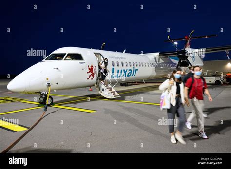 happy passengers boarding klm and luxair flights in europe