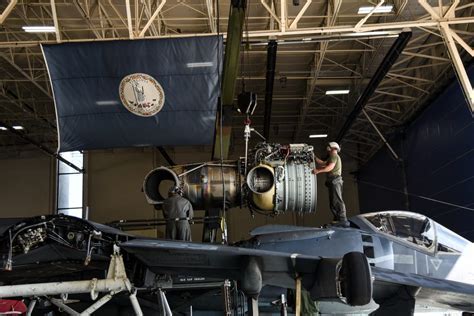Harrier jet engine and nozzle maintenance inside a private hangar