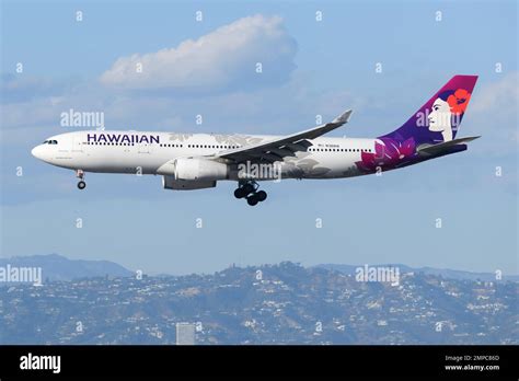 hawaiian airlines airbus a330 on the tarmac in papeete tahiti airport