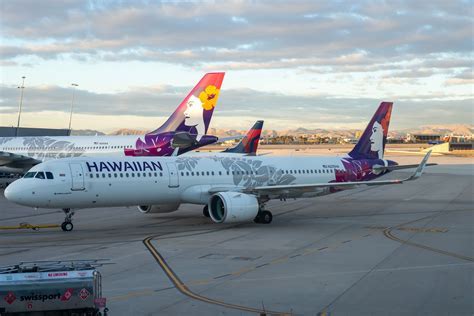 hawaiian airlines plane over pacific ocean
