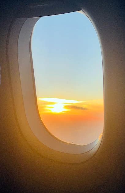 Hawaiian beach sunset view from plane window shortly before landing