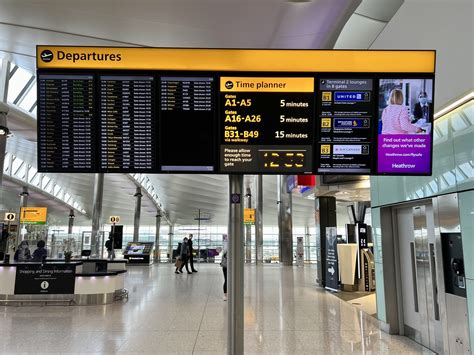 Heathrow departures board showing global destinations