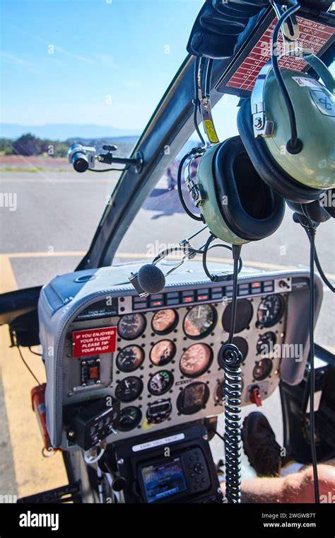 helicopter cockpit view over Naples shoreline