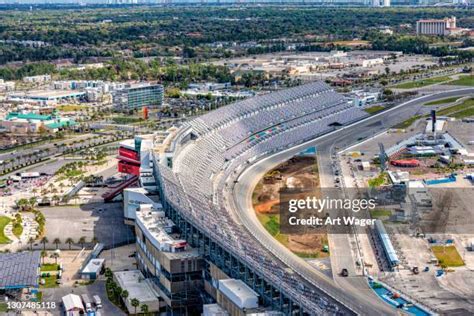 helicopter flying above daytona international speedway during race weekend