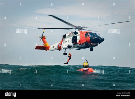 helicopter rescue operation during coast guard training mission