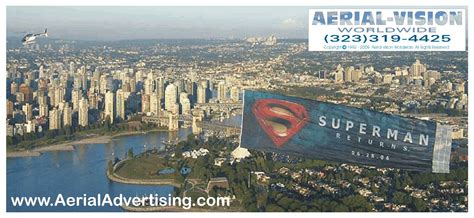 helicopter towing massive fabric banners