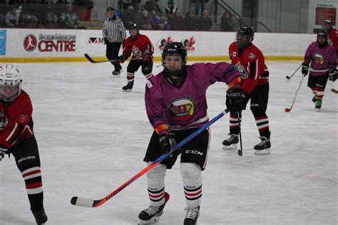 HEROS Hockey volunteers at lemonade booth during Air Canada fundraiser