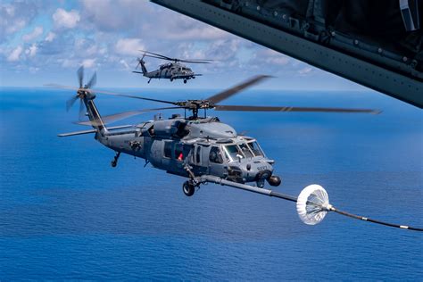 HH-60G Pave Hawk hovering during nighttime extraction with FLIR guidance