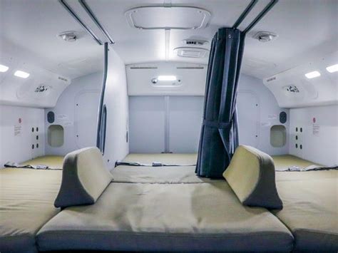hidden Boeing 787 pilot crew rest compartment with aviation bunk beds