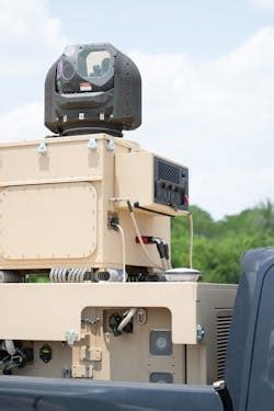 high-energy laser system targeting hostile drone during defense demonstration