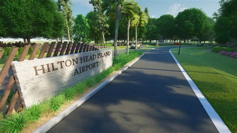 Hilton Head Island Airport exterior with palm trees and check-in area