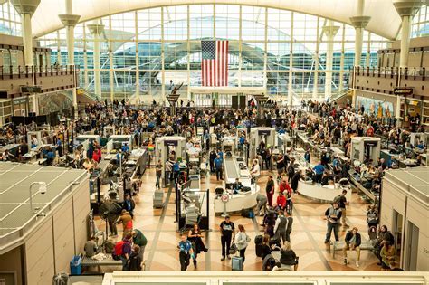 holiday weekend travelers in security lines at Denver International Airport