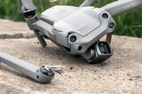 holy stone drone crash on pavement with broken propellers