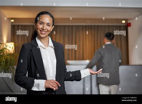 hotel concierge welcoming guest luxury lobby check in experience