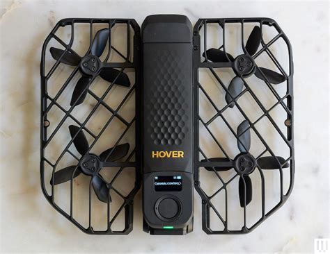 hoverair x1 capturing solo traveler near cliffside trail