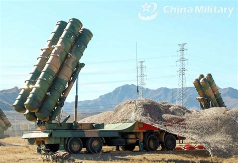 HQ-9C missile launch vehicle in formation during military parade in Beijing