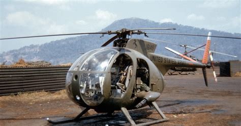 Hughes OH-6 Cayuse in Vietnam combat operation, showing distinctive teardrop fuselage and rotor system