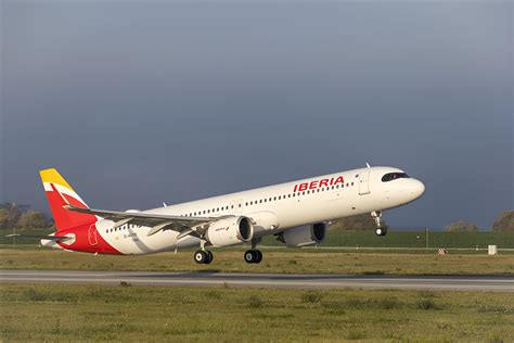 iberia airbus a321xlr at madrid airport preparing for transatlantic flight