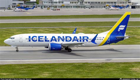 icelandair boeing 737 max flying over iceland’s midnight sun and glaciers