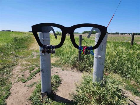 iconic black-framed glasses at start of Buddy Holly memorial trail
