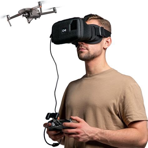 immersive drone pilot wearing VR goggles launching DJI drone at sunrise