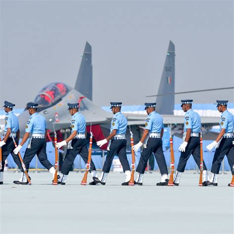 Indian Air Force pilot beside retired MiG-21 during decommissioning ceremony