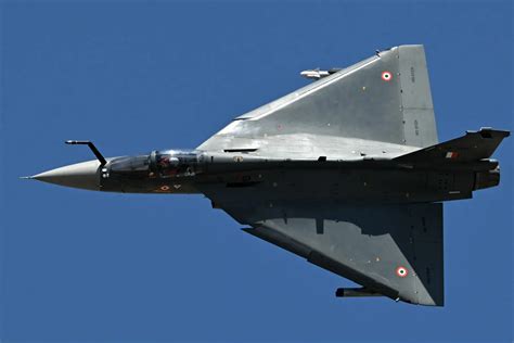 Indian Air Force Rafales conducting low-altitude pass near disputed Himalayan border zones