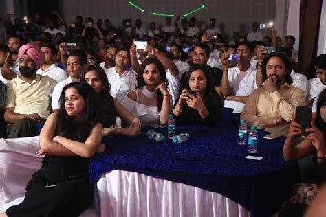 indian and filipino professionals meeting at a cross-cultural trade seminar in delhi