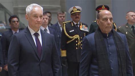 indian and russian defence officials at su-30mki production line