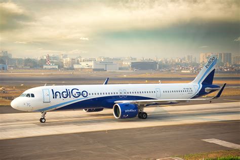 IndiGo Airbus A321neo at New Delhi IGI Terminal 3 gates with Delta codeshare signage