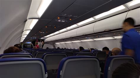 Interior cabin view of a Wizz Air aircraft during boarding