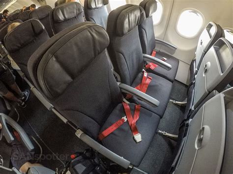 Interior cabin view of Air Canada Rouge Economy class seats