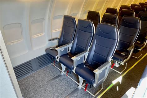 Interior cabin view of an Avelo Airlines Boeing 737 with passengers seated