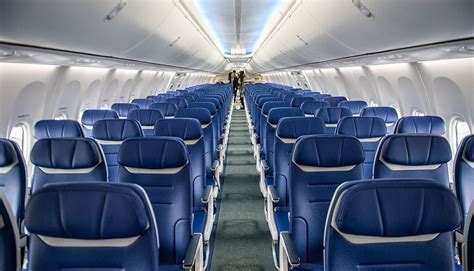Interior cabin view of Boeing 737 MAX with Vietnam Airlines branding concept