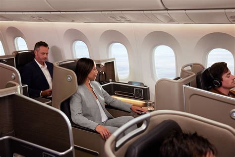 Interior of BermudAir Embraer E190 showing premium cabin seating