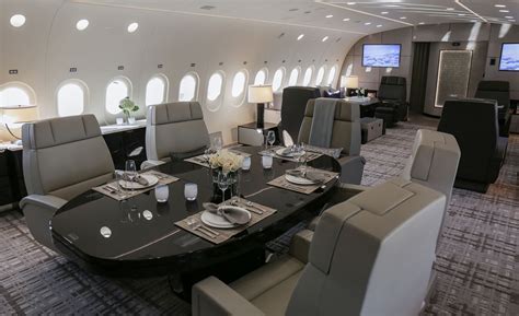 interior of Boeing 787-8 VIP jet with gym and spiral staircase